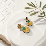 boucles d'oreilles circulaires avec triangle